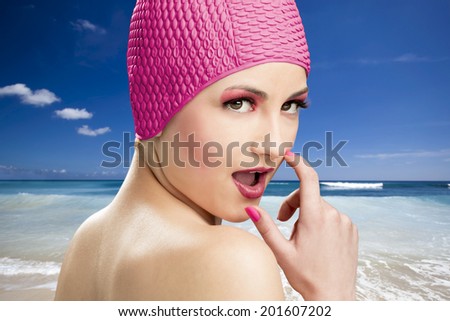 Portrait of a beautiful woman wearing a swim cap
