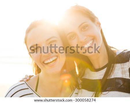 A portrait of best friends laughing