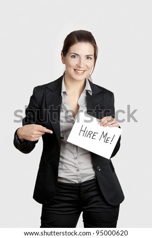 Business woman holding a card board with the text message \