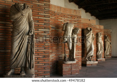 greek-roman statues in the arcades of the monastery shen meri, apollonia, albania