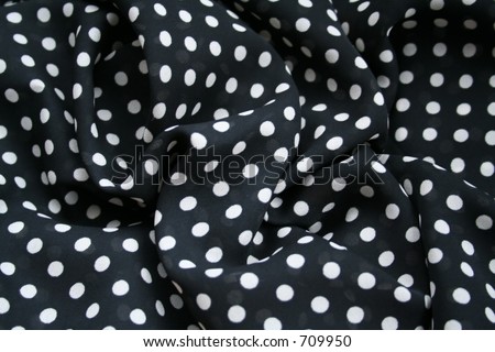 Black and white polka dot background