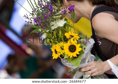 woman buying a bouquet of flowers at the North Market in Columbus, Ohio