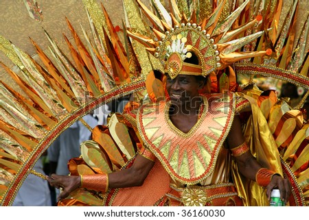 ST. JOHN, U.S. VIRGIN ISLANDS, JULY 9: A man in a colorful carnival costume in the St. John Carnival parade held July 9, 2009 in St. John, U.S. Virgin Island.