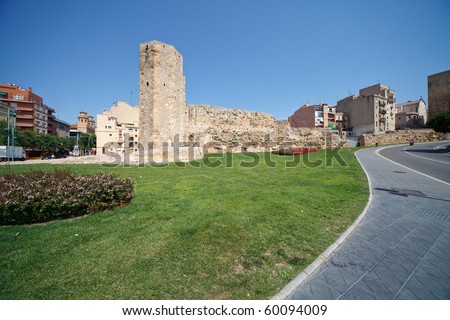 Tower of the era of ancient Rome in the modern urban landscape of Tarragona, Spain