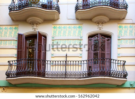 Balconies in old house in Barcelona, Spain