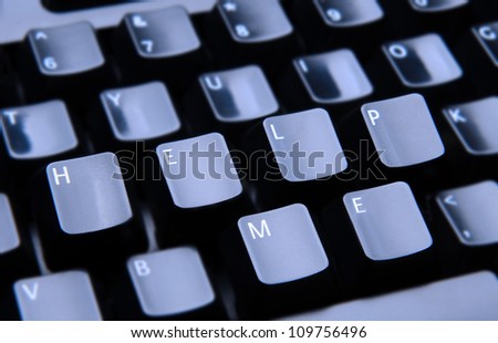 The words Help Me spelled out on a computer keyboard. Only the keys forming Help Me are in focus.