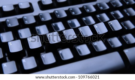 The words Success spelled out on a computer keyboard. Only the keys forming Success are in focus.