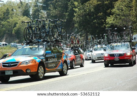 RUNNING SPRINGS, CA - MAY 21: Support vehicles for the Amgen Tour of California follow Stage 6 on May 21, 2010. The Tour of California is the largest cycling event in America.