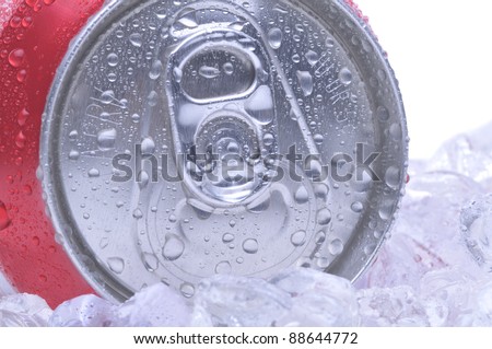 Close Up of a Red Soda Can Top with Ice and Condensation white background.