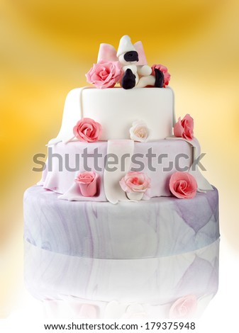 Birthday cake with  roses isolated on yellow