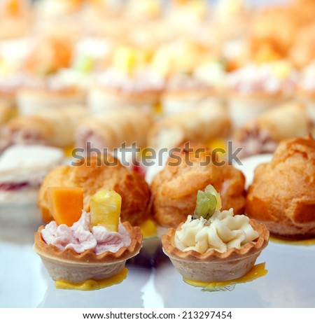 Finger foods (sweet and savoury foods) with space for your text or logo