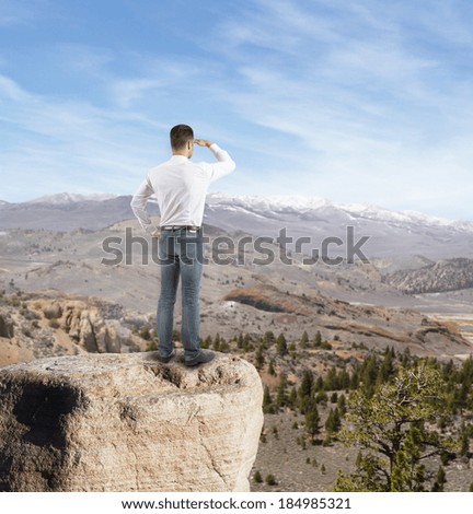 businessman thinking and looking on mountain