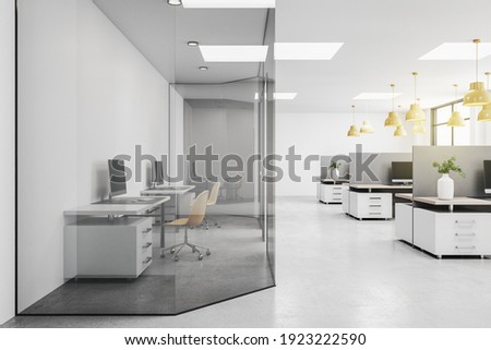 Side view on modern open space office with two isolated by glass walls workplaces. 3D rendering