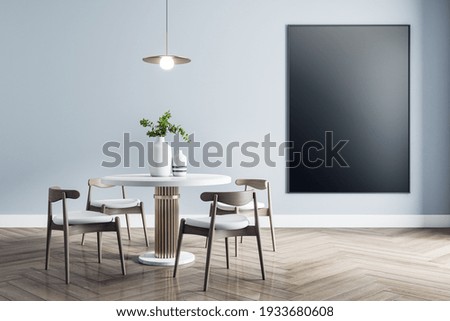 Blank black poster on light wall in dining room with modern white furniture with golden details and wooden parquet. Mock up, 3D rendering