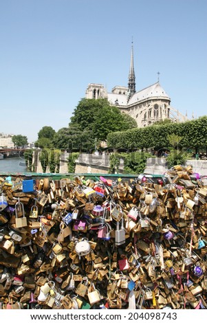 PARIS, FRANCE - JUNE 2014: Love padlocks on the  Pont de l\'Archeveche brigde in Paris , June 12, 2014