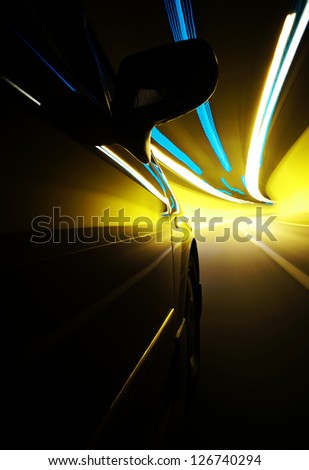 Night driving-Dramatic motion blur tunnel light