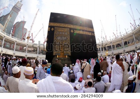 MECCA, SAUDI ARABIA-CIRCA MAY 2015: Fisheye view of Muslims gettiing ready to pray around the Kaaba in Masjidil Haram in Makkah, Saudi Arabia. The mosque is under construction to expand space for hajj