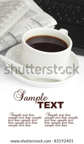 cup of coffee,newspaper and notebook with sample text