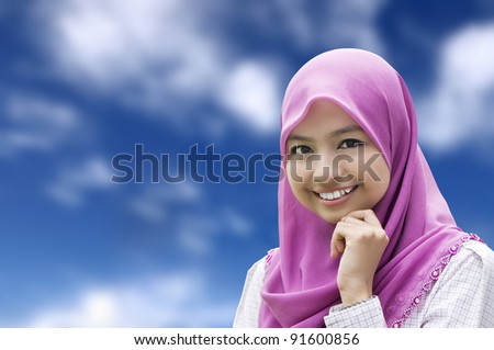 portrait of beautiful young Muslim woman with sweet smile