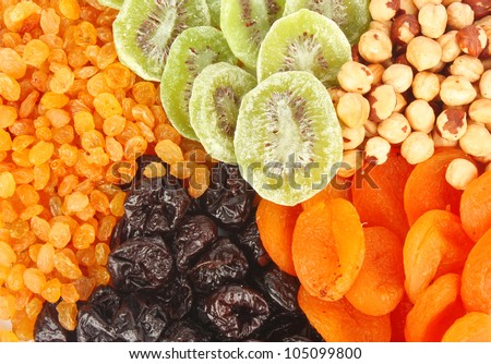 Mixed dried fruits background, health food concept.