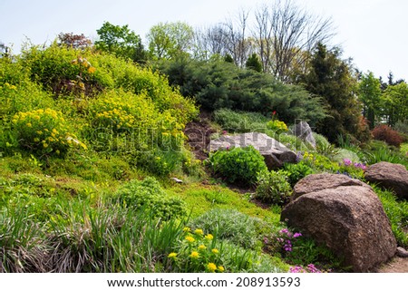 Land-art-park, landscaping with plant, pond and walkway for relax, arboretum Sofievka