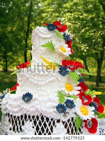 Wedding cake with bright flowers