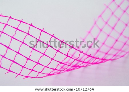 Closeup of pink wavy decoration (net, wire)