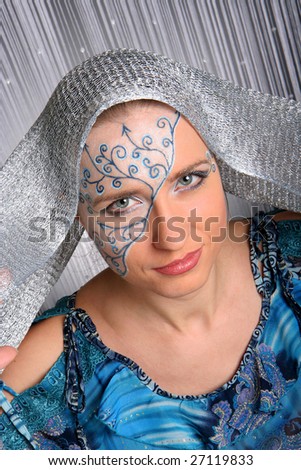 Extraordinary makeup closeup, woman in photo studio