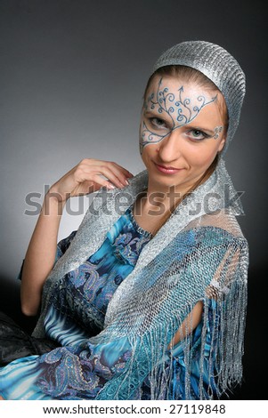 Extraordinary makeup closeup, woman in photo studio