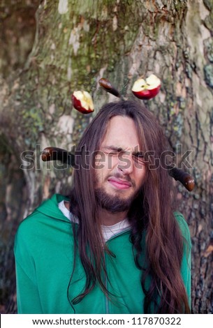 Throwing knife into apple on a guy\'s head