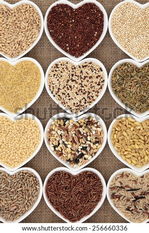 Grain selection in heart shaped dishes over hessian background.