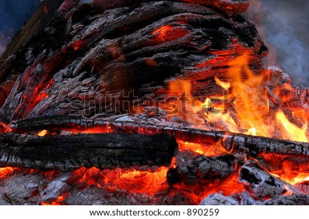 Wood Fire with flames, ash, embers and charcoal.