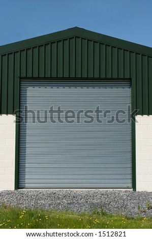 Steel roller shutter doors on a new constructed barn.