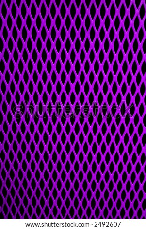Purple metal grill of diamond shaped mesh, against black.