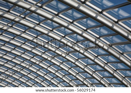 Conservatory Roof Span With Curved Metal Joists And Glass Window Panes ...