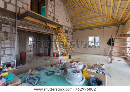 Materials for repairs and tools for remodeling  in the house (building) that is under remodeling, renovation, extension, restoration, reconstruction and construction (upgrade) 商業照片 © 