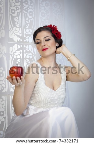Portrait of young beauty lady in white elegant dress looking like a Snow White princess