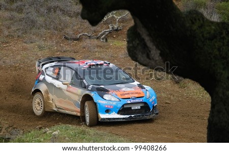 ALGARVE, PORTUGAL - MARCH 31: Mads Osteberg (Nor) driving is Ford Fiesta RS WRC in Rally de Portugal 2012 on March 31, 2012 in Algarve, Portugal