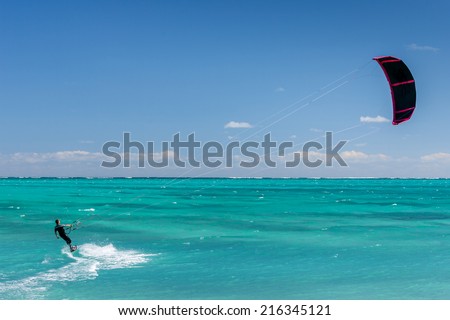 SALARY, MADAGASCAR, JUN 6: An unidentified kitesurfer surfing in the lagoon of Salary, Madagascar on june 6, 2010