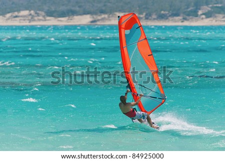Windsurfer windsurfing in the lagoon