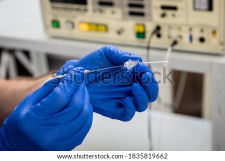 Cardiologist use tubes for radiofrequency catheter ablation. Сток-фото © 