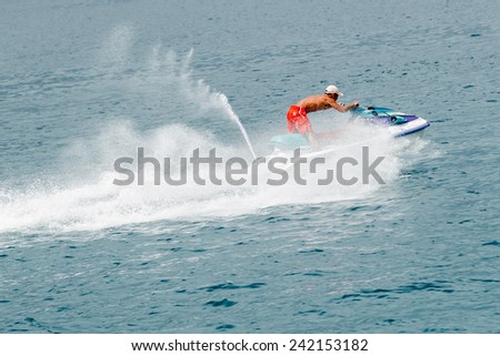 Jet ski flying over the sea