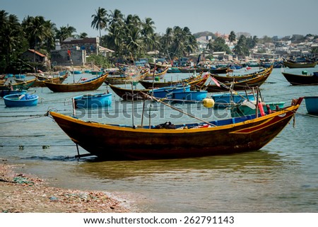 Old fishing boat in blue bay. Vietnam. background