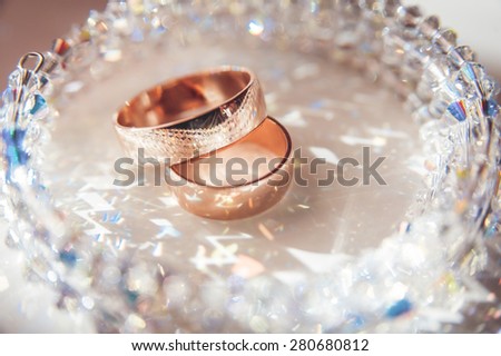Golden rings on the table. Wedding
