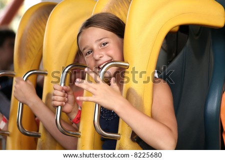 Cute girl on roller coaster