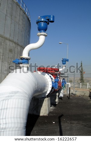 Industrial Water Pipe Line near Water Tower
