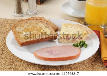 Quiche Lorraine with whole wheat toast and juice