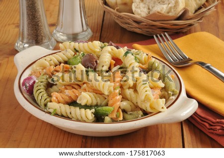 Mediterranean pasta salad with Greek olives and dinner rolls