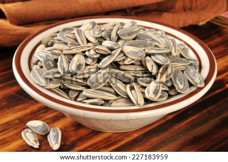 A bowl of salted in the shell sunflower seeds