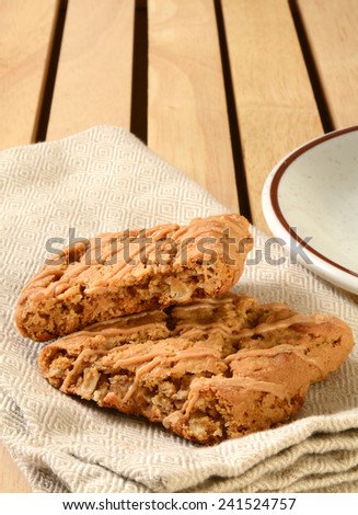 High fiber peanut butter oatmeal breakfast bars on a napkin, with space for copy